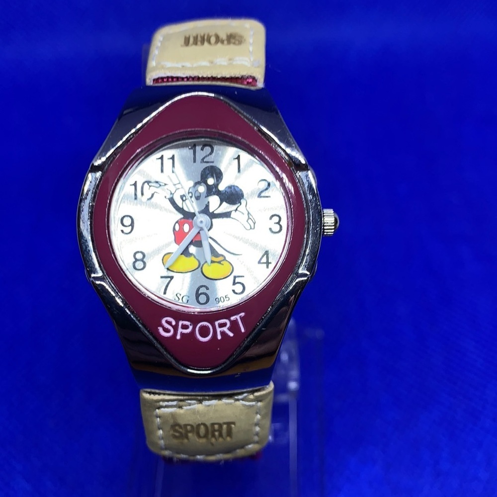 3/$20.  Mickey Mouse ladies sport watch
